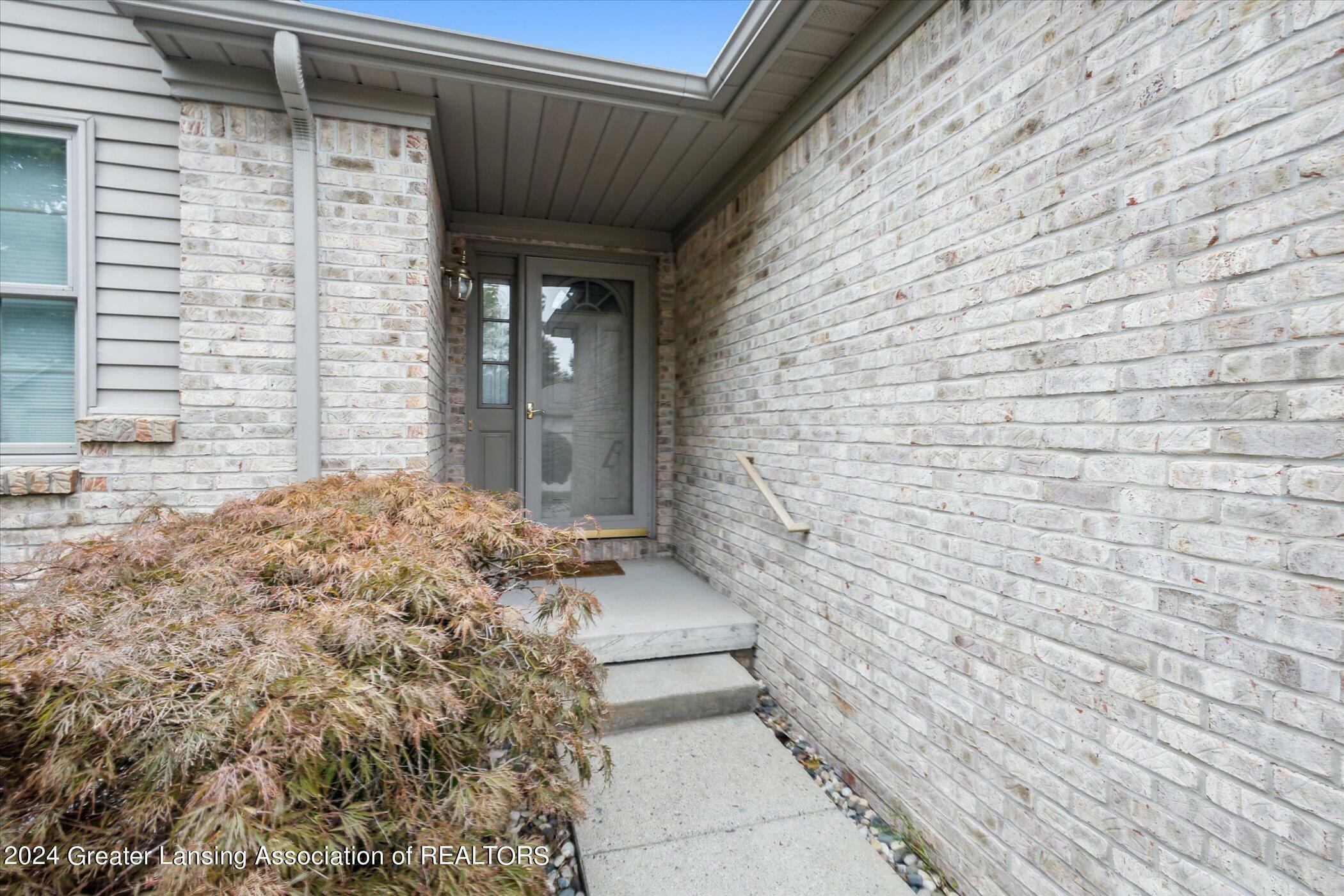 Property Photo:  1275 Emerald Drive  MI 48813 