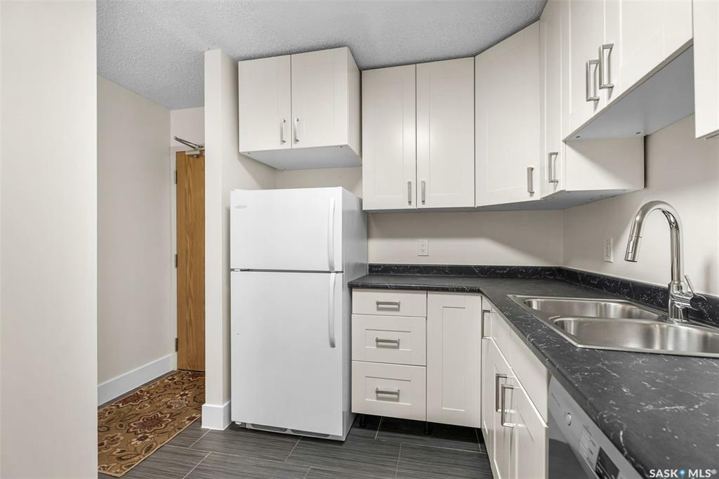 Property Photo:  325 Kingsmere Boulevard 103  SK S7J 4J6 