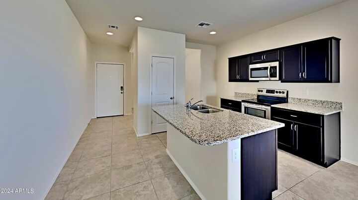 Photo de la propriété: 11418 E Cliffrose Lane AZ 85132