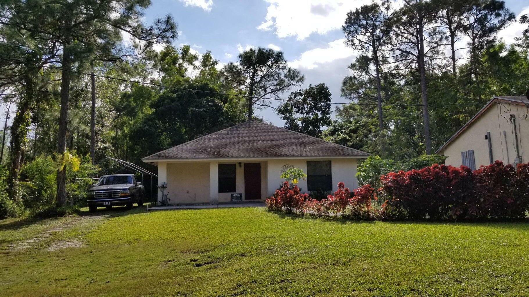 Property Photo:  12218 56th Place N Guest House  FL 33411 