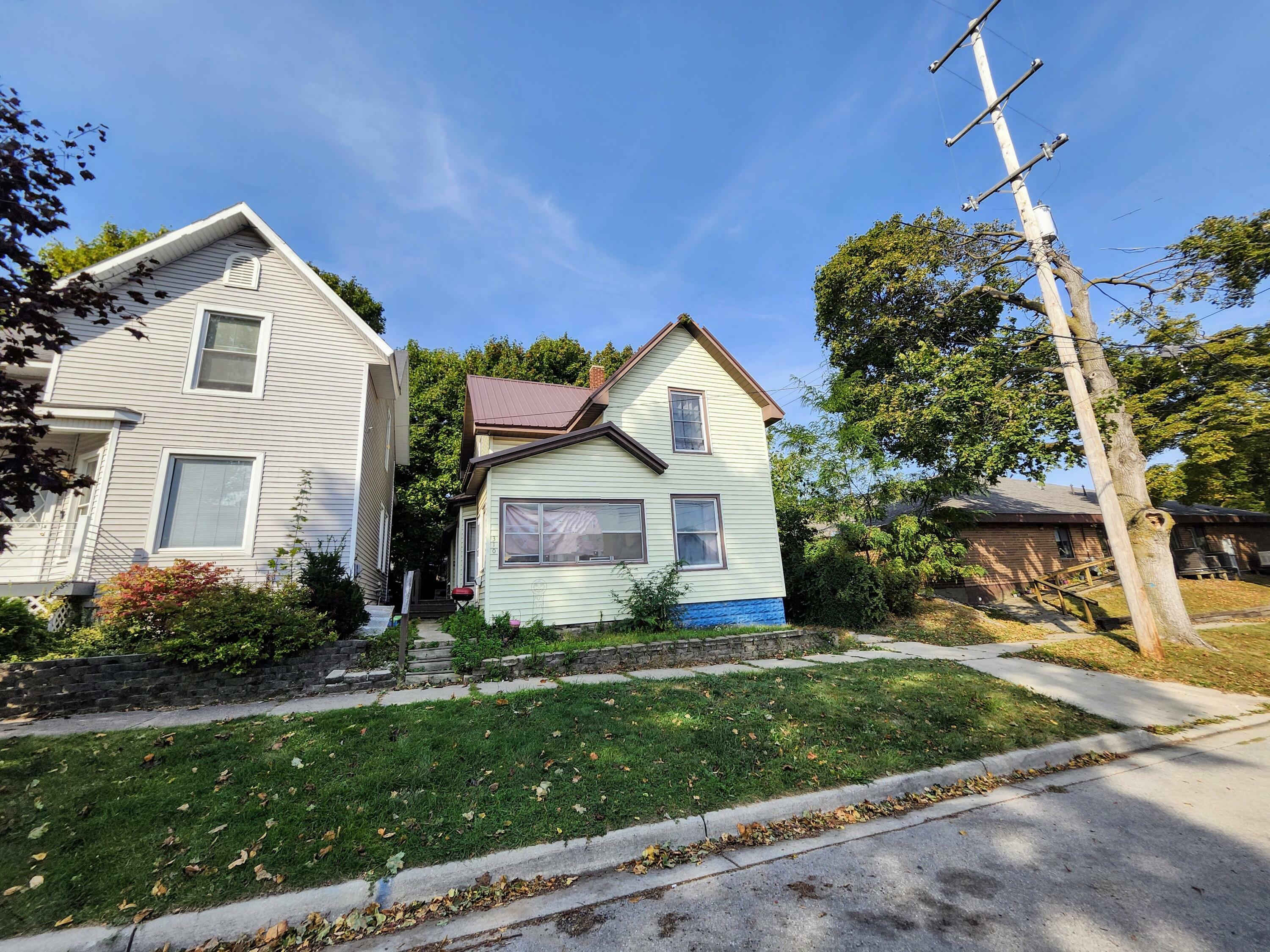 Property Photo:  310 Sycamore Street  MI 49660 