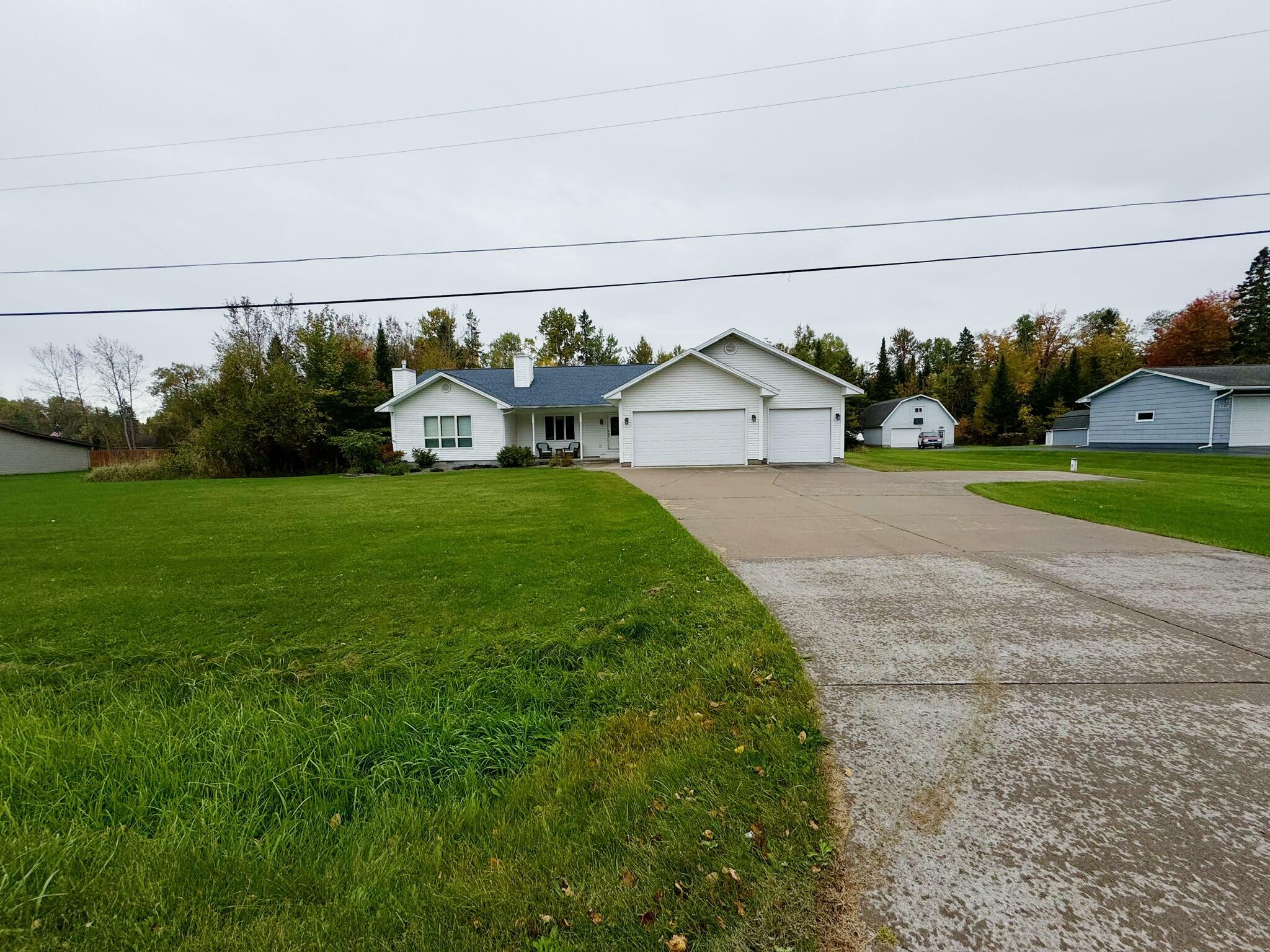 Property Photo:  3216 S Sun Glo Dr  MI 49783 