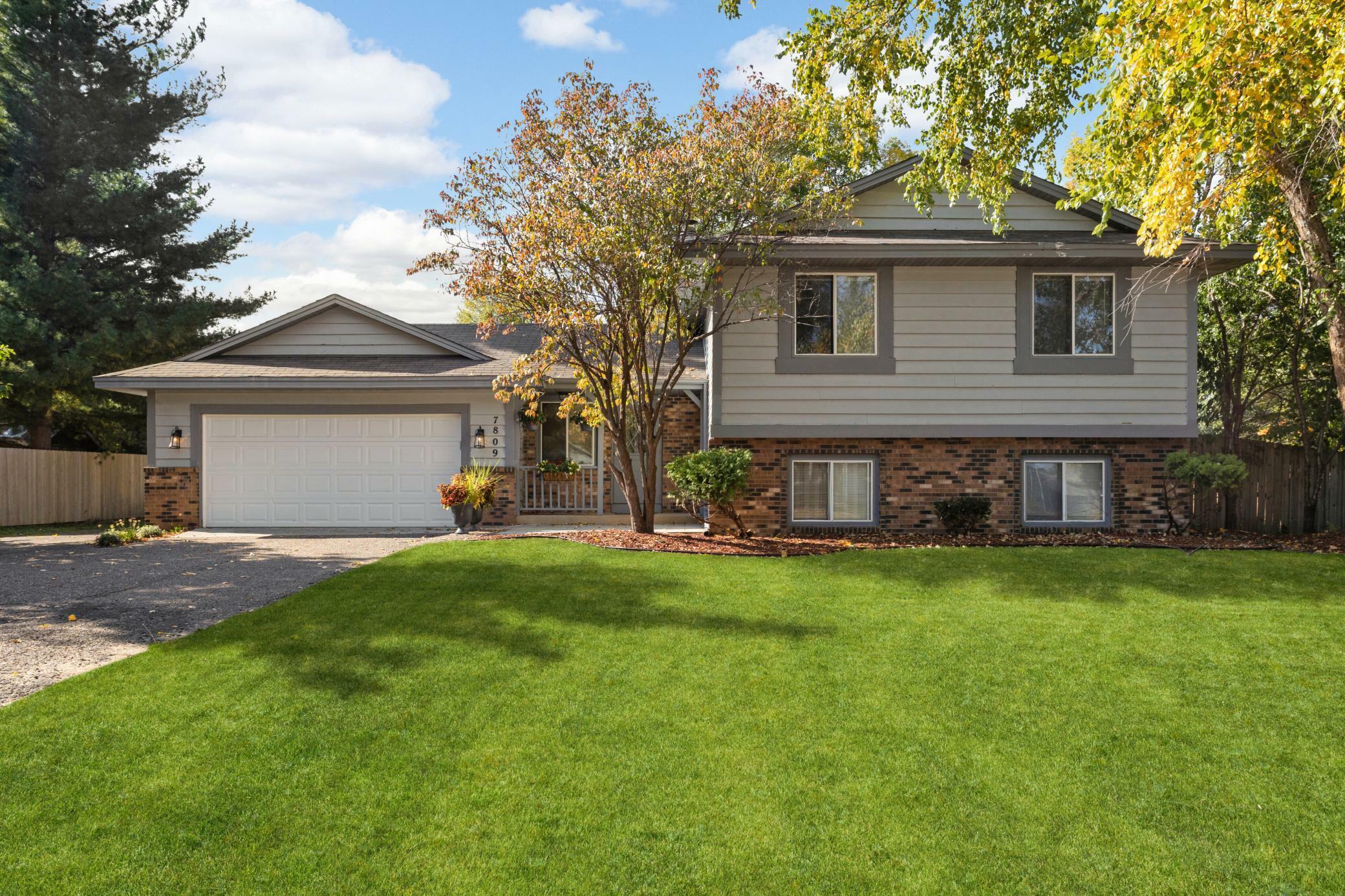 Property Photo:  7809 Emerson Avenue N  MN 55444 