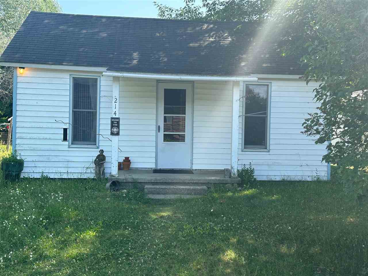 Property Photo: 214 E Depeyster MI 49701