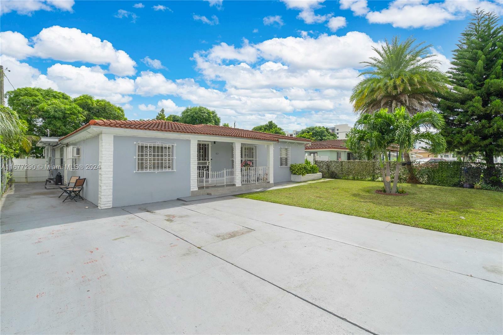 Property Photo:  821 NW 40th Ave  FL 33126 