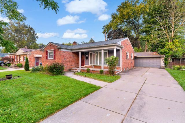 Property Photo:  7655 N Charlesworth Street  MI 48127 1613 