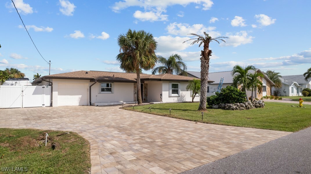 Property Photo:  1713 SE 39th Street  FL 33904 