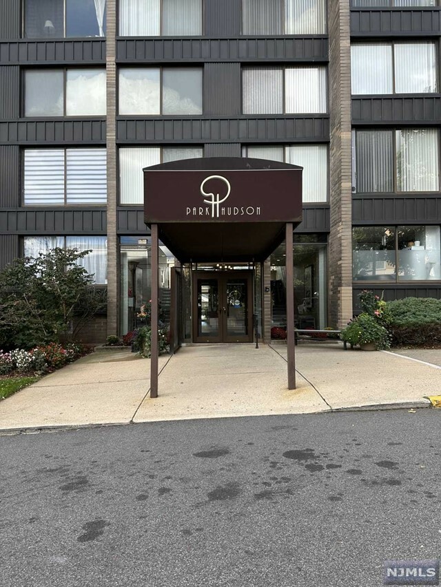 Property Photo:  9060 Palisade Avenue 716  NJ 07047 