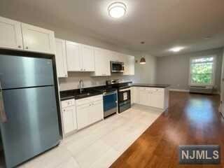 Property Photo:  116 Essex Street 303  NJ 07601 