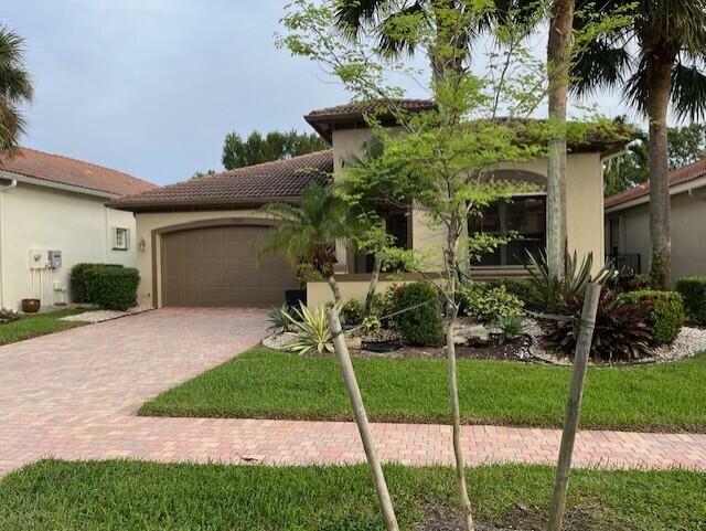 Property Photo:  9823 Isles Cay Drive  FL 33446 