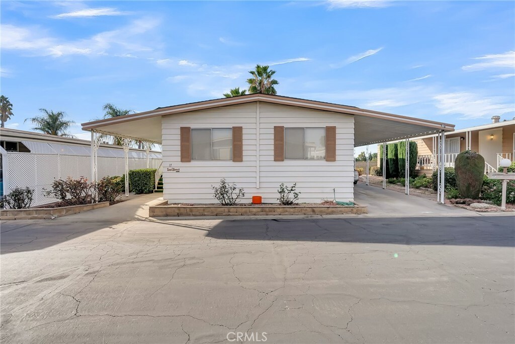 Property Photo:  23820 Ironwood Avenue 17  CA 92557 