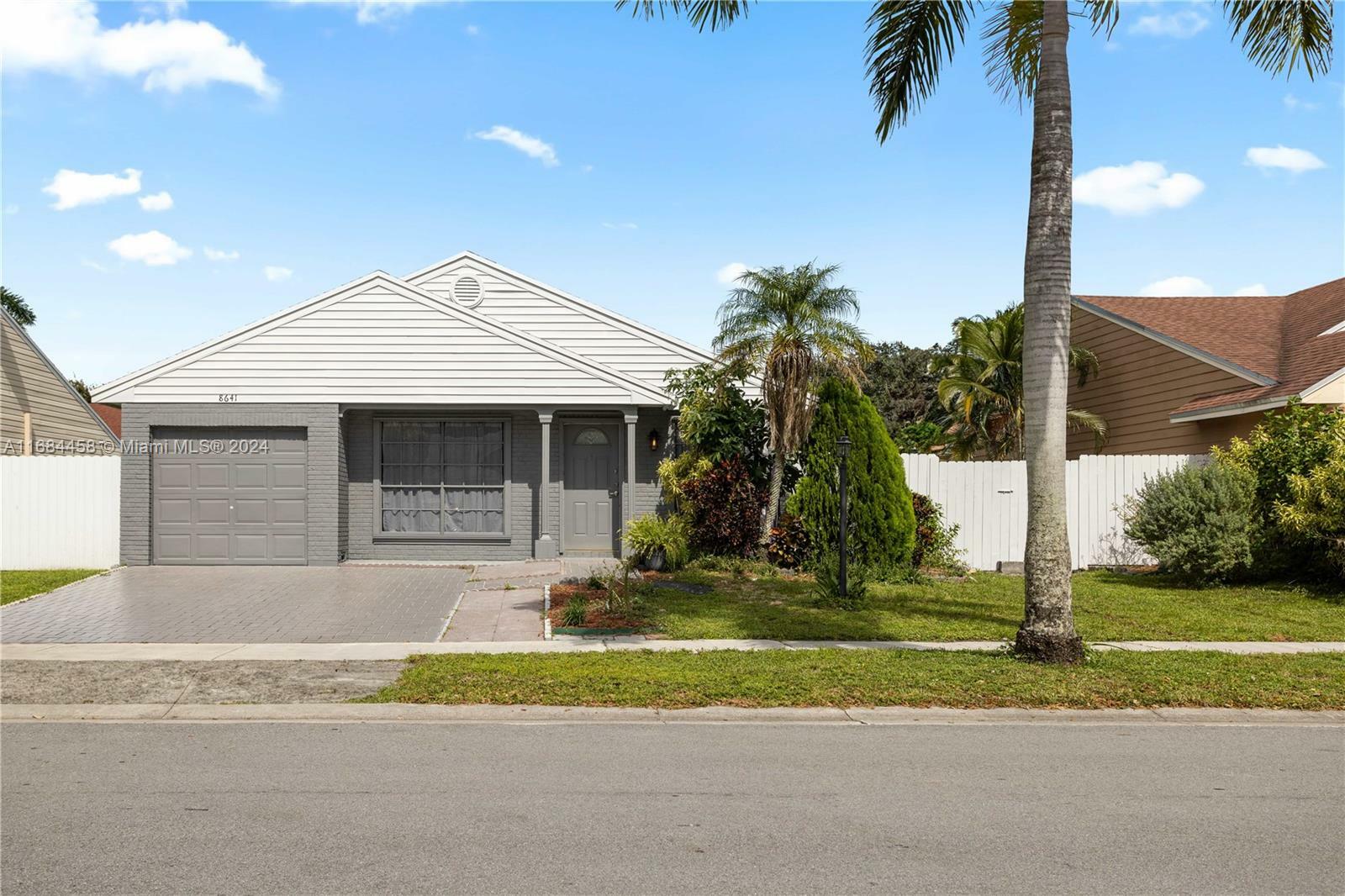 Property Photo:  8641 SW 15th St  FL 33025 