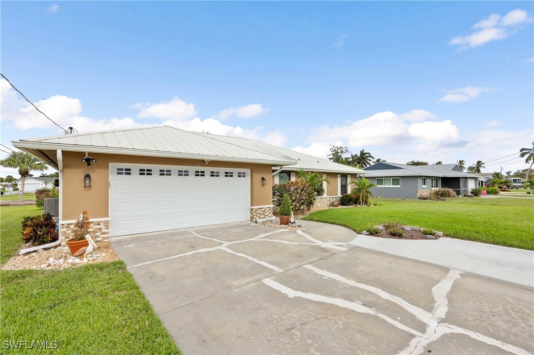 Property Photo: 6148 Plumosa Avenue FL 33908