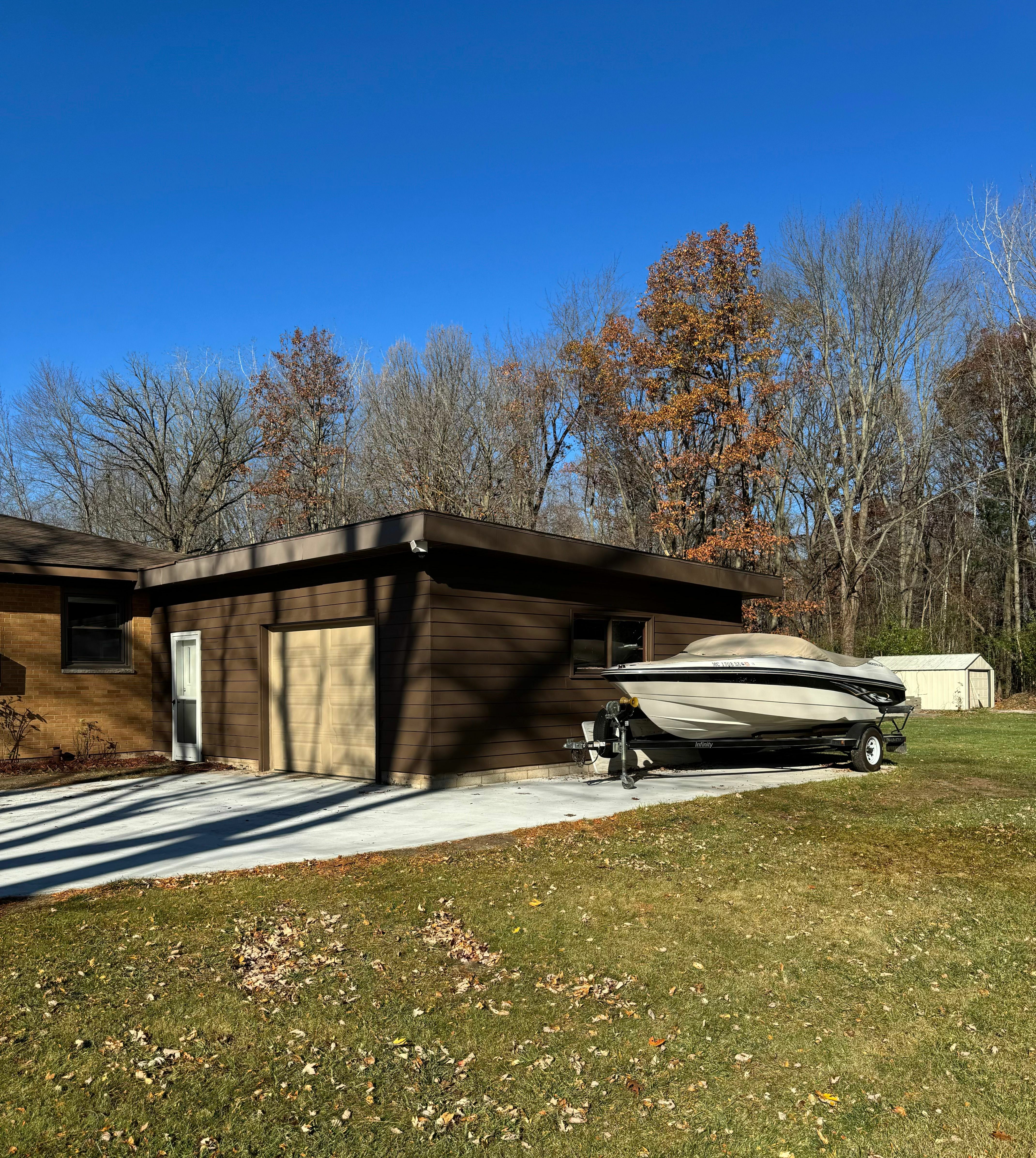 Property Photo:  2311 E Ginter Road  MI 48640 8936 