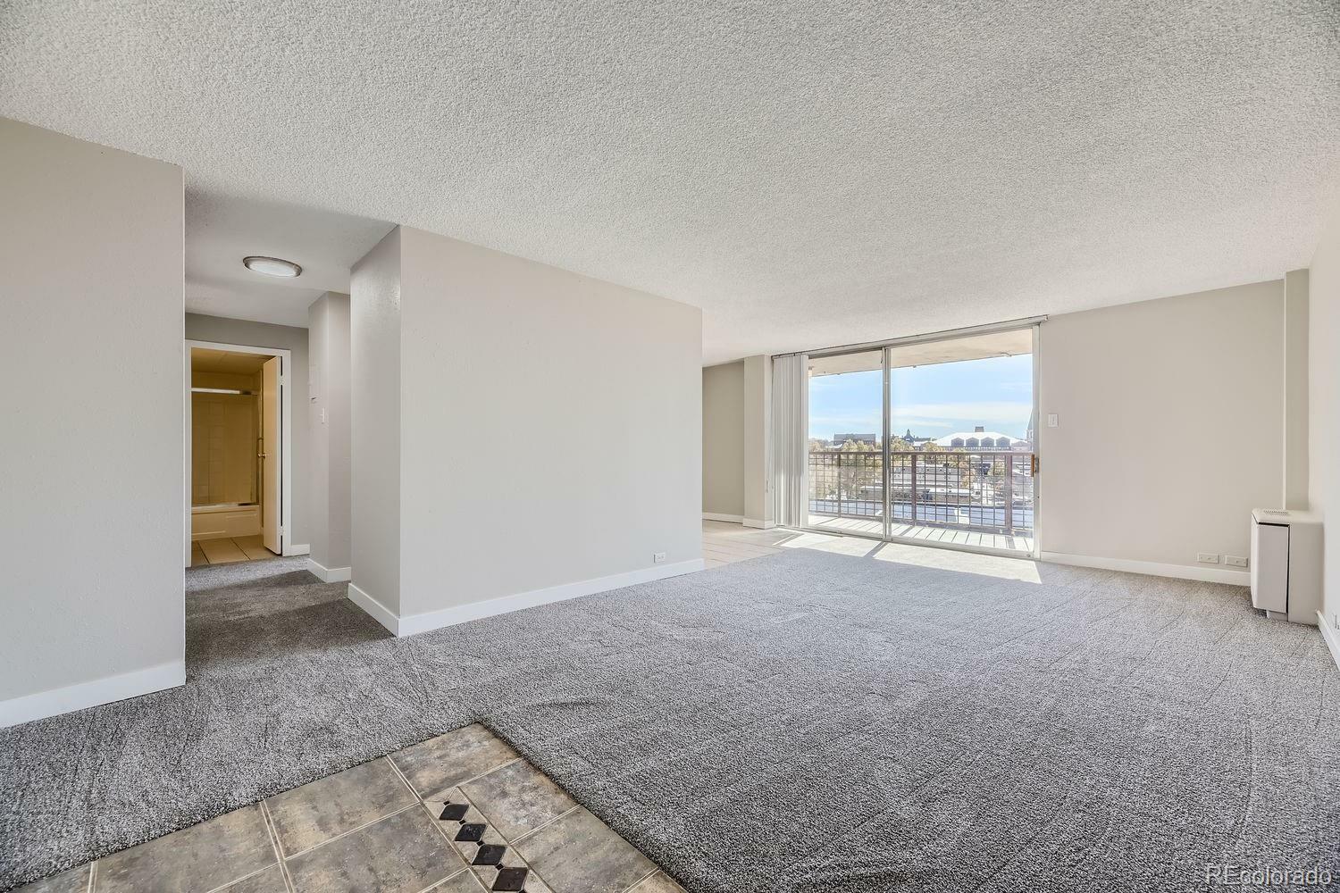 Property Photo:  2225 Buchtel Boulevard 908  CO 80210 