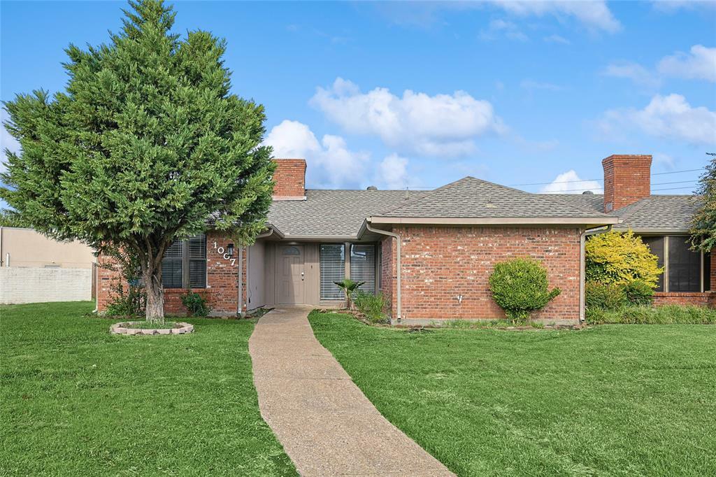 Property Photo:  1007 Wimbledon Lane  TX 75075 