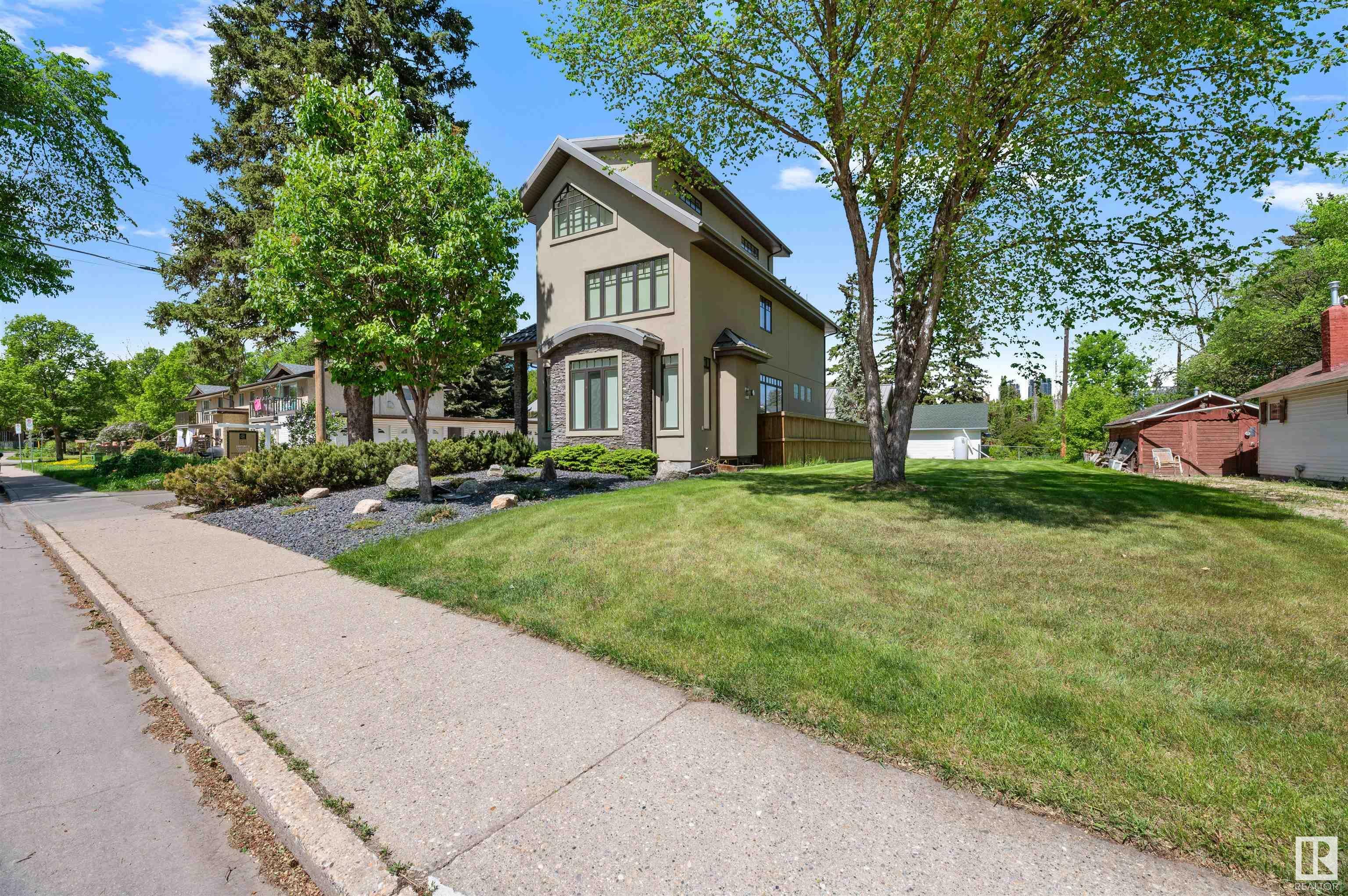 Property Photo:  8728 101 Avenue NW  AB T5H 0A9 