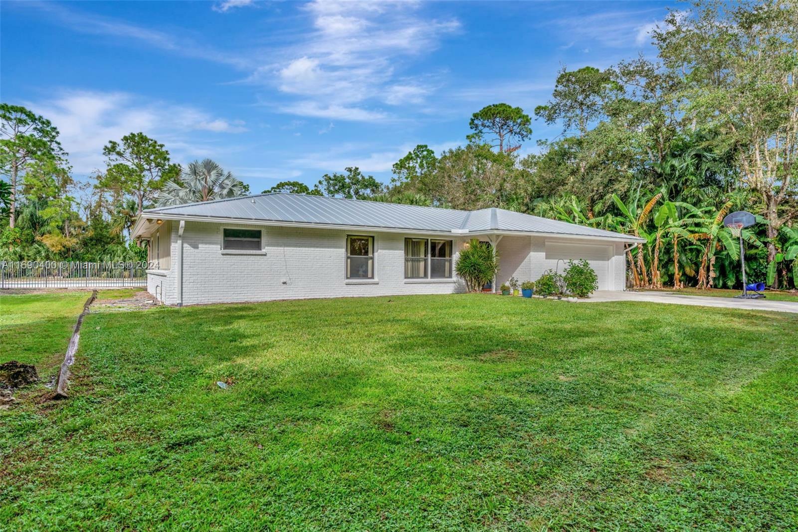 Property Photo:  11219 N 169th Ct N  FL 33478 