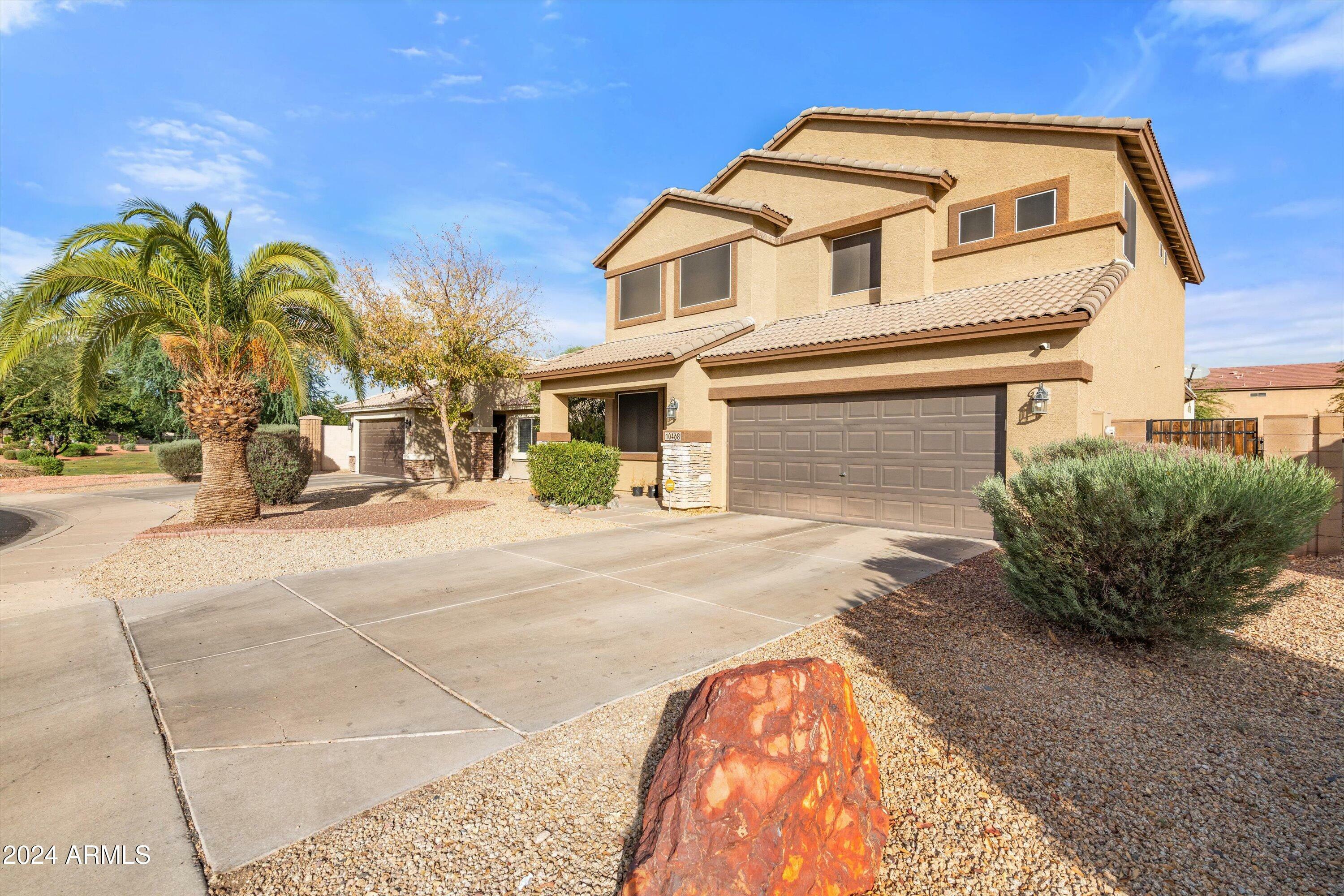 Property Photo:  10468 W Palm Lane  AZ 85392 