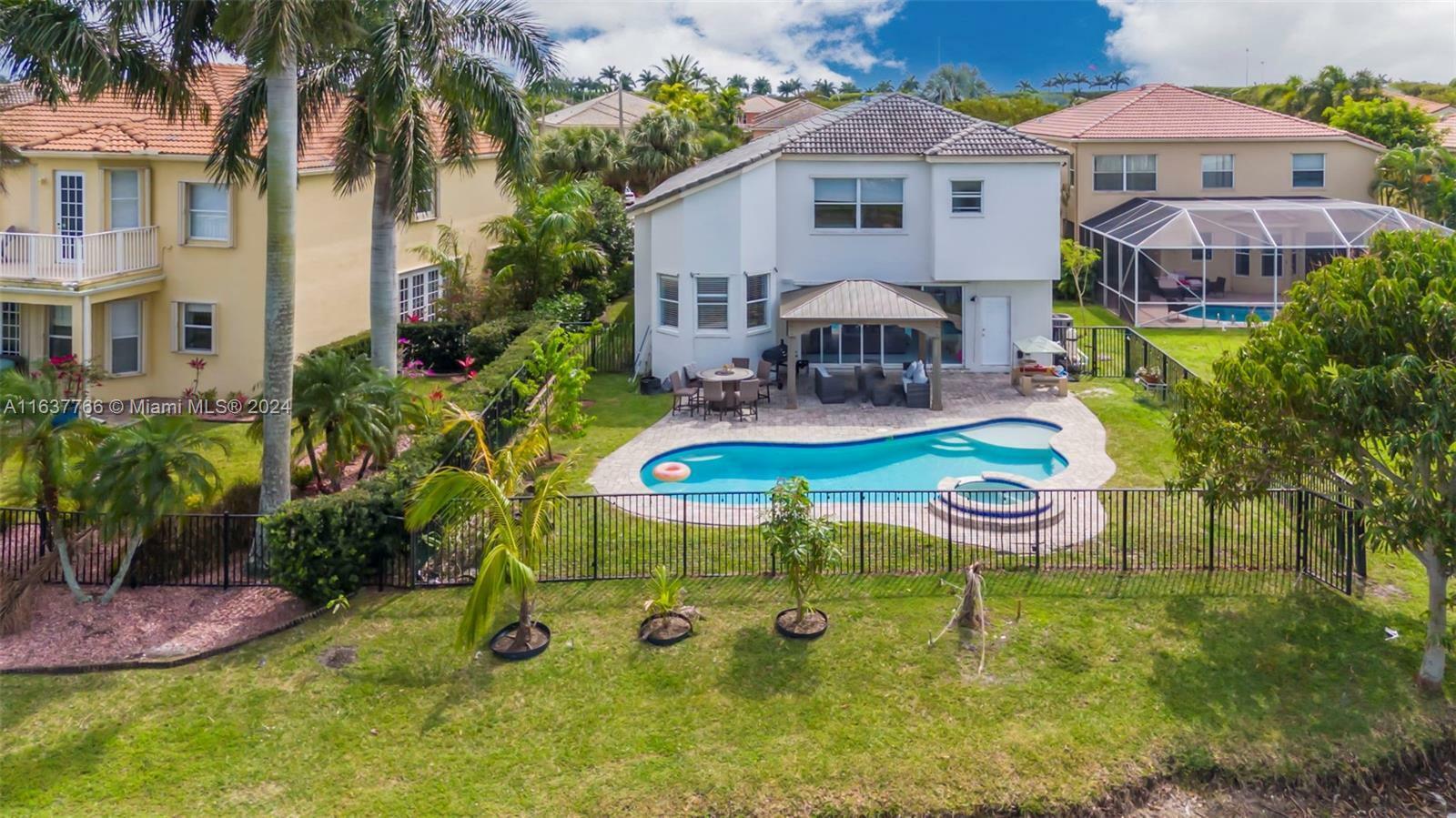 Property Photo: 9851 Woolworth Court FL 33414
