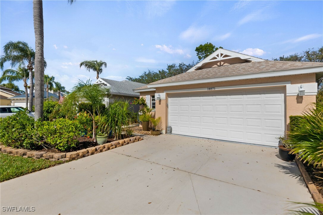 Property Photo:  14871 Sterling Oaks Drive  FL 34110 