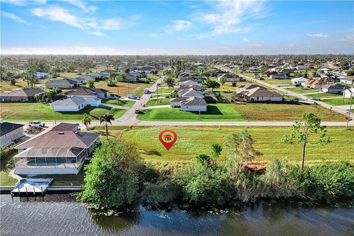 Property Photo: 1915 NW 26th St FL 33993