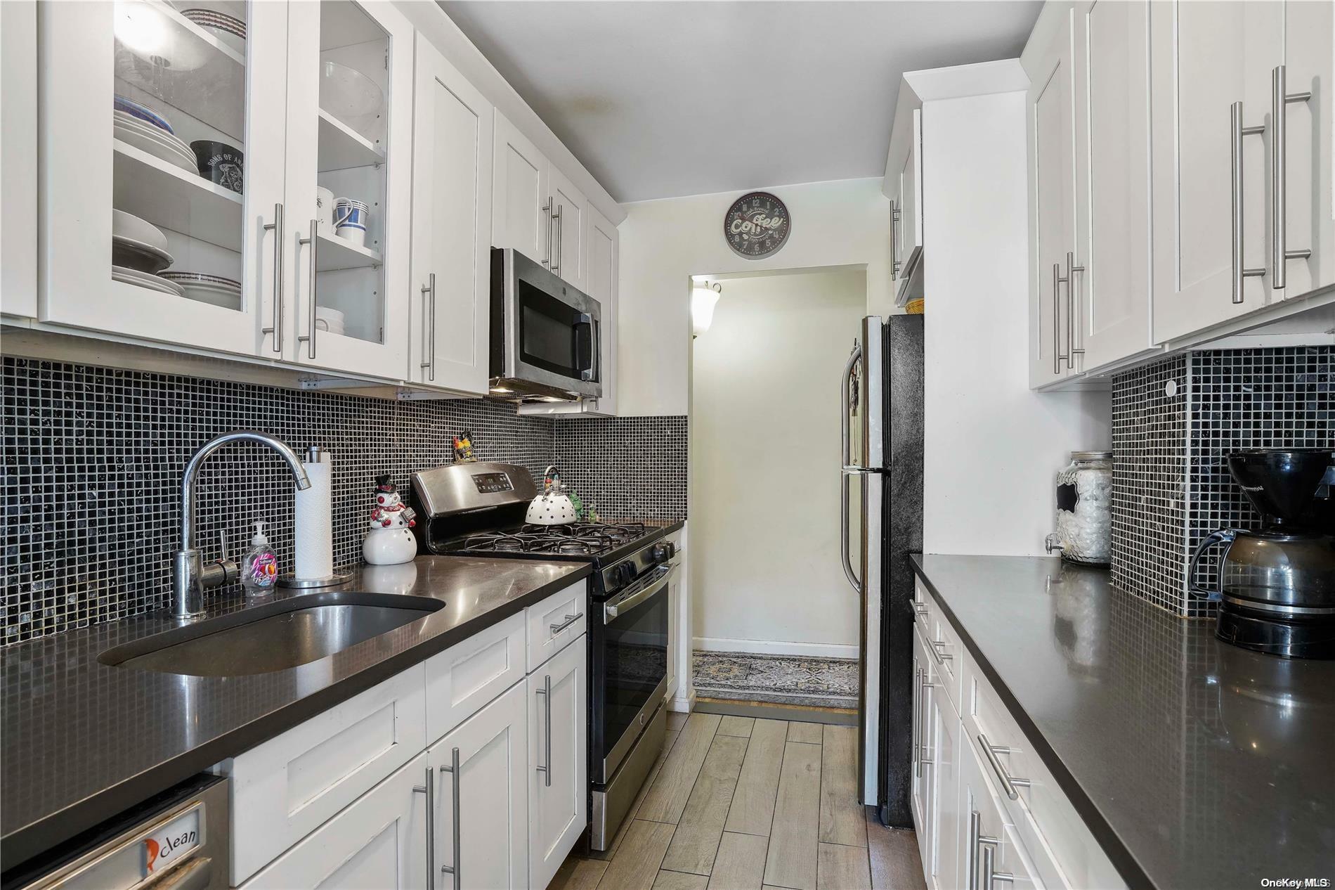 Property Photo:  84-10 153rd Avenue 2K  NY 11414 