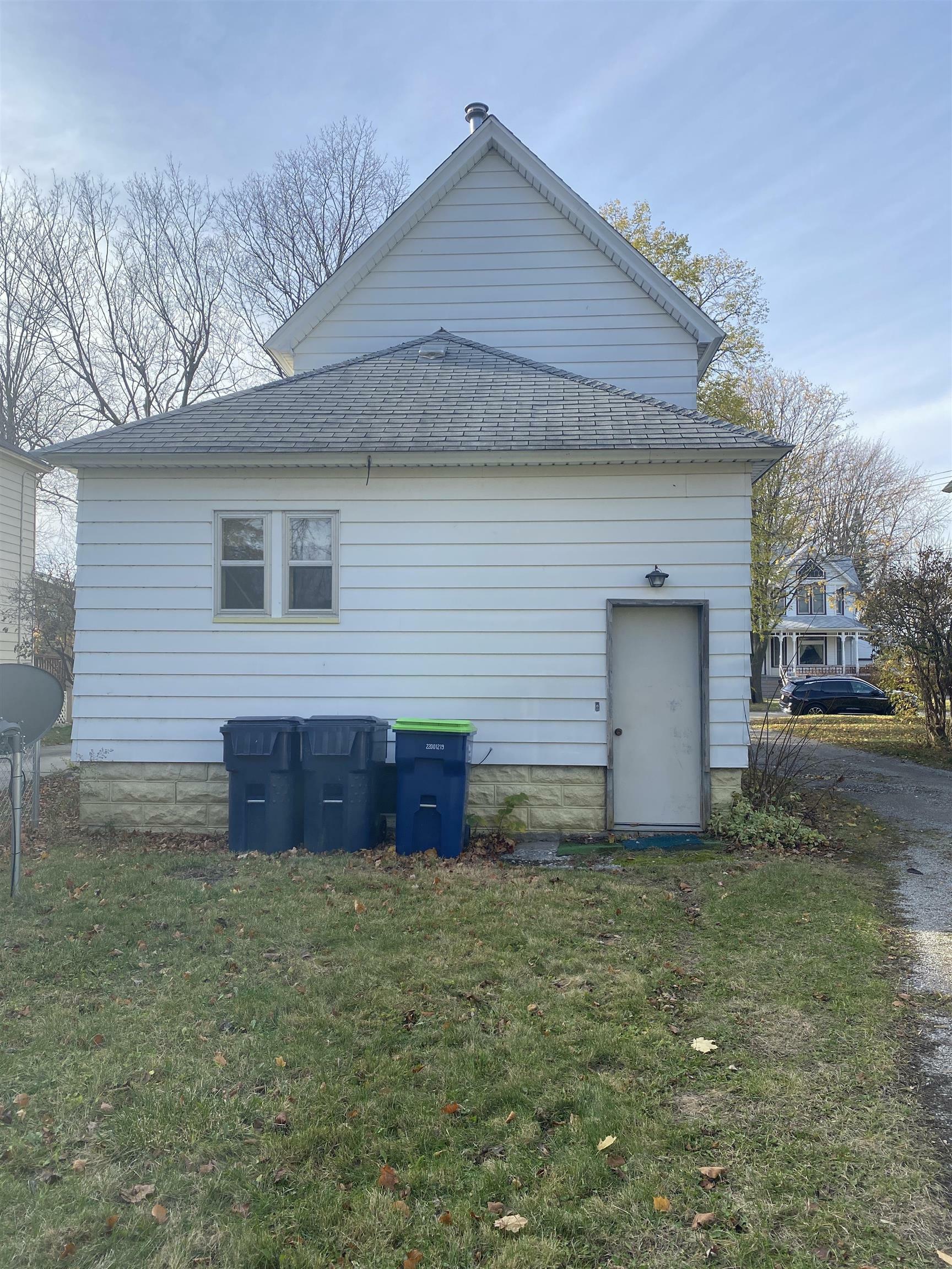 Property Photo:  209 Raymond Street  MI 48706 