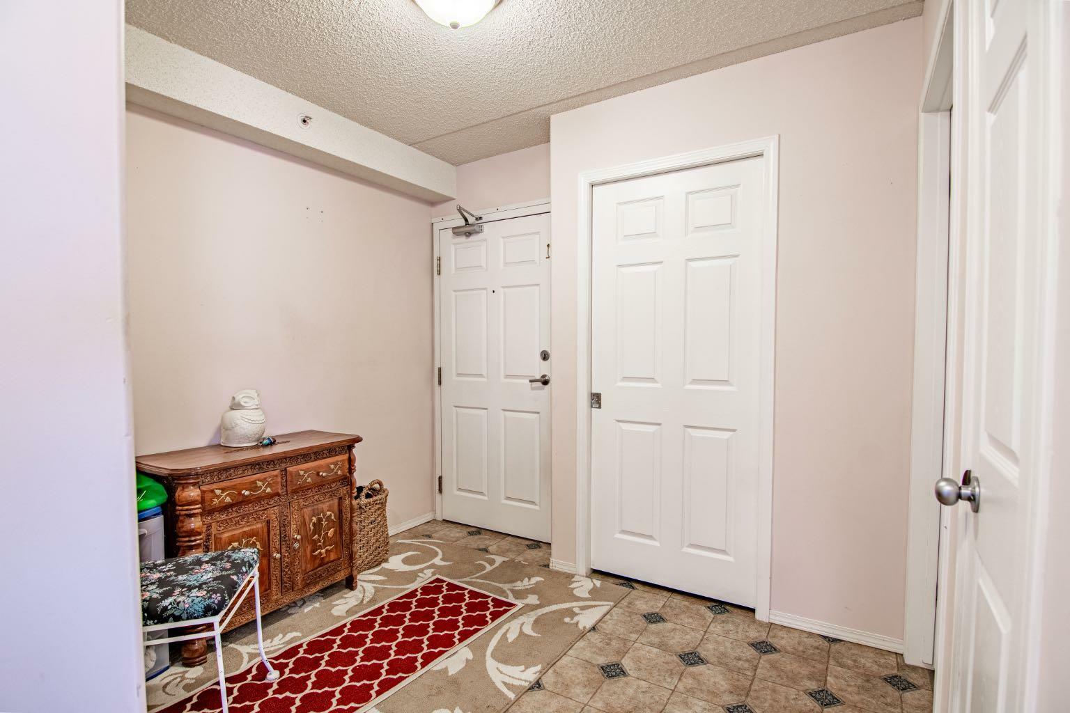 Property Photo:  4319 49 Street 308  AB T4G 1Y4 