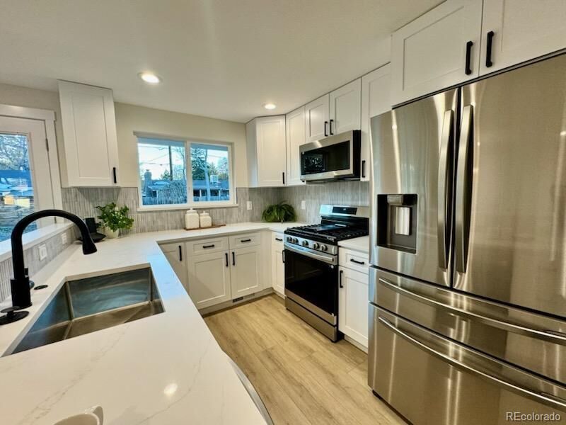 Property Photo:  2131 S Gray Street  CO 80227 
