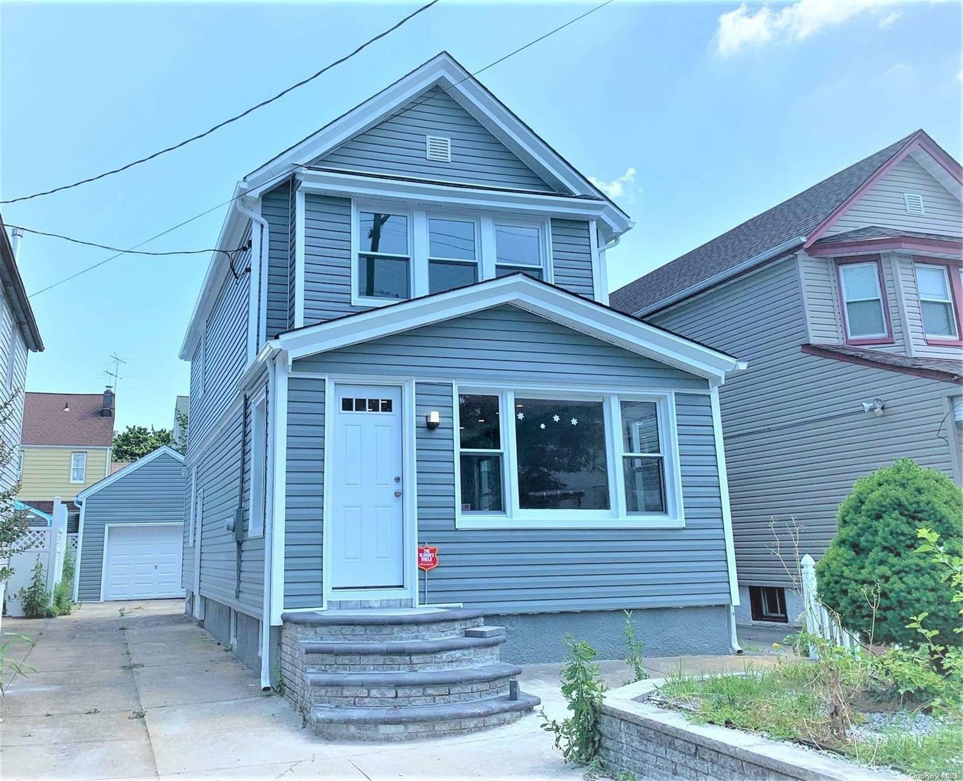Property Photo: 90-43 209th Street NY 11428