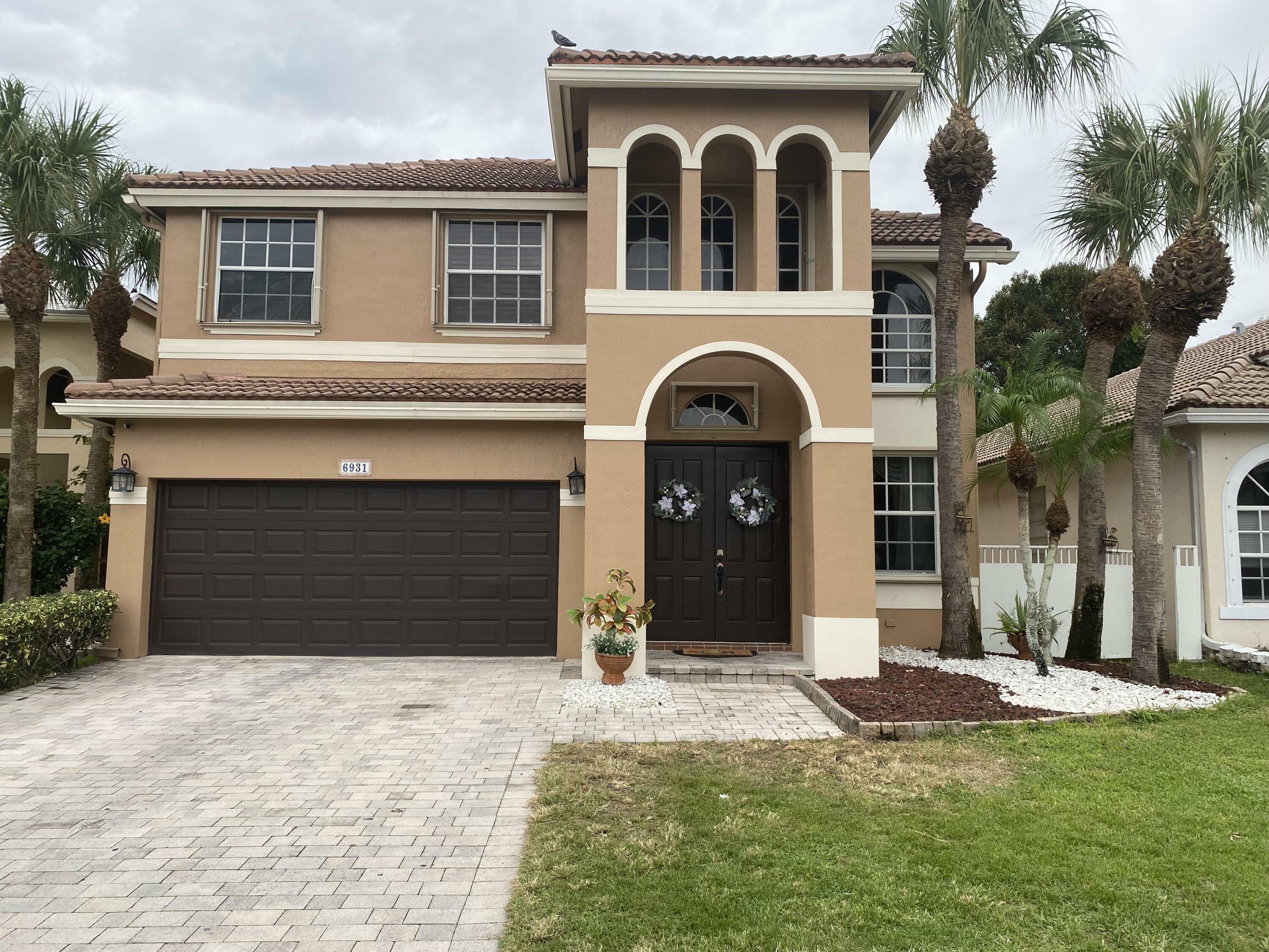 Property Photo:  6931 Spider Lily Lane  FL 33462 