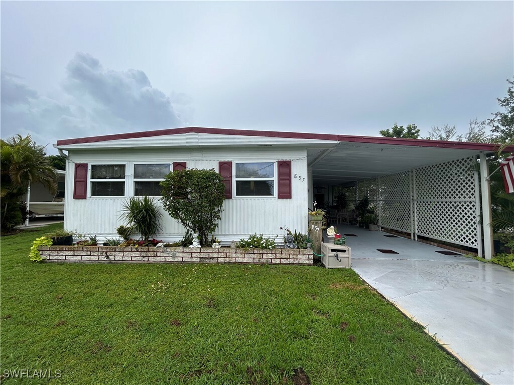 Property Photo:  857 Manatee Road  FL 34114 