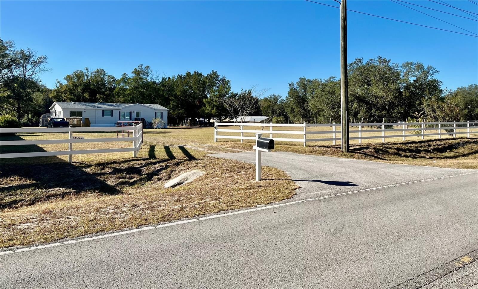 Property Photo:  18711 Powerline Road  FL 33523 
