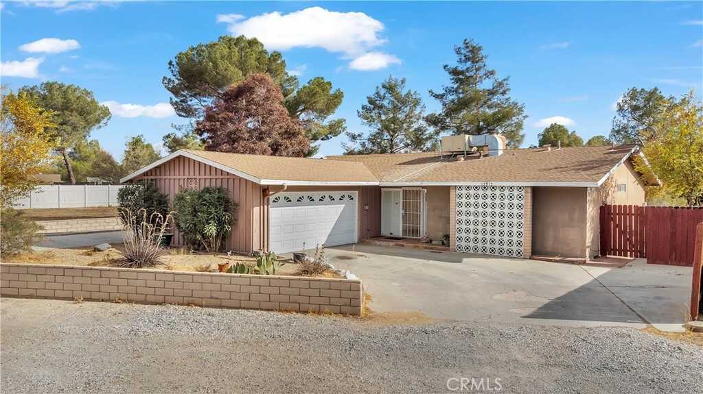 Property Photo:  13915 Green Tree Boulevard  CA 92395 