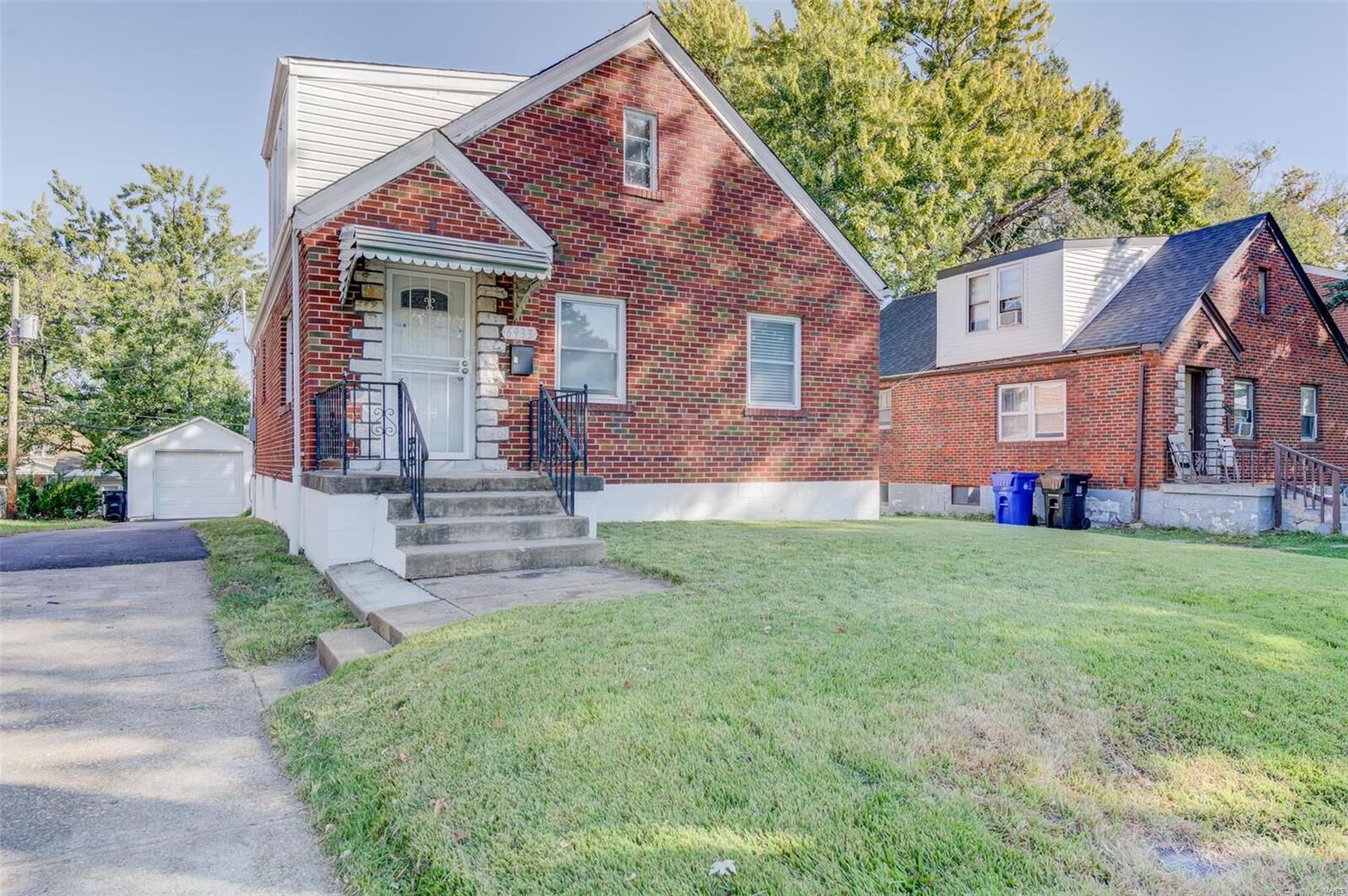 Property Photo:  6933 Julian Avenue  MO 63130 