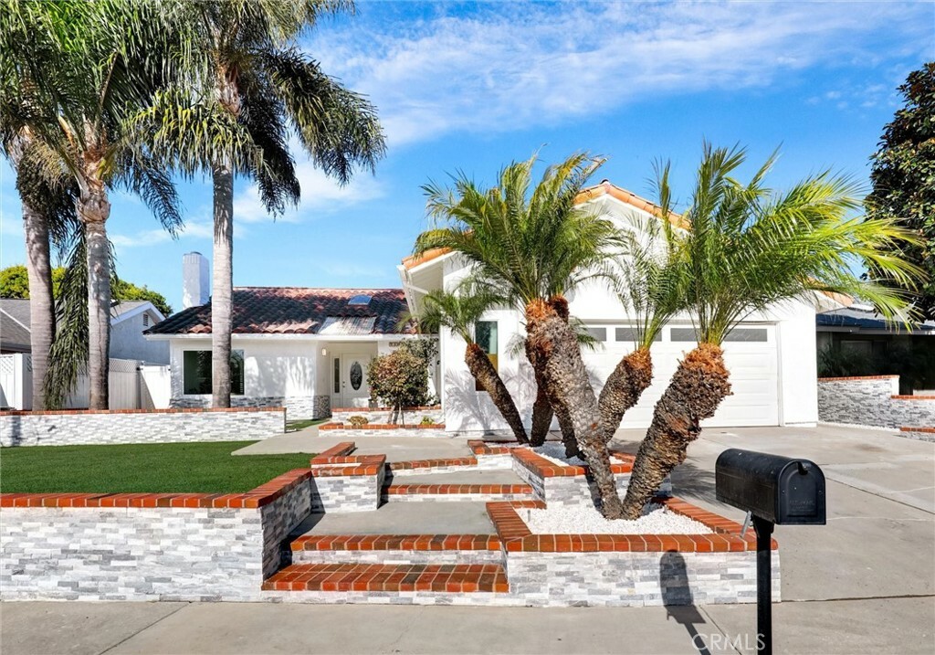 Property Photo:  7191 Sunbreeze Drive  CA 92647 