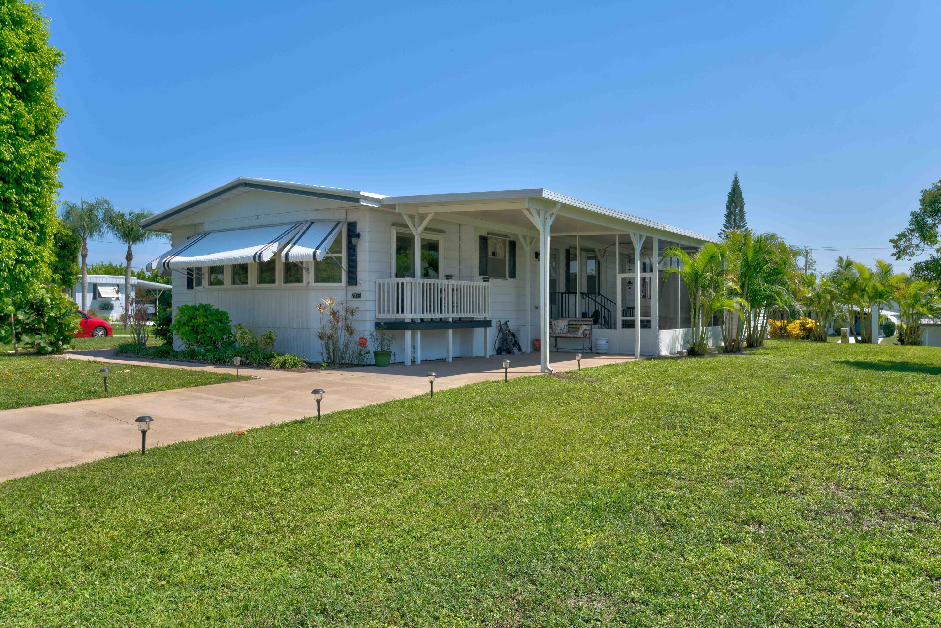 Property Photo:  7075 SE Bluebird Circle  FL 33455 