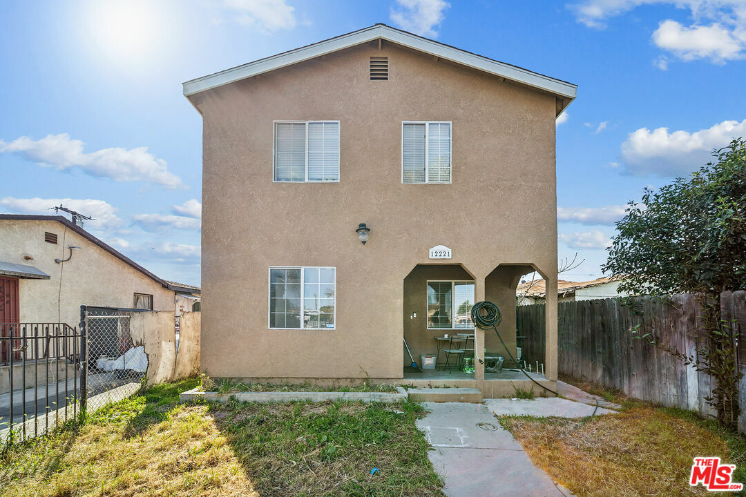 Property Photo:  12221   Athens Way  CA 90061 