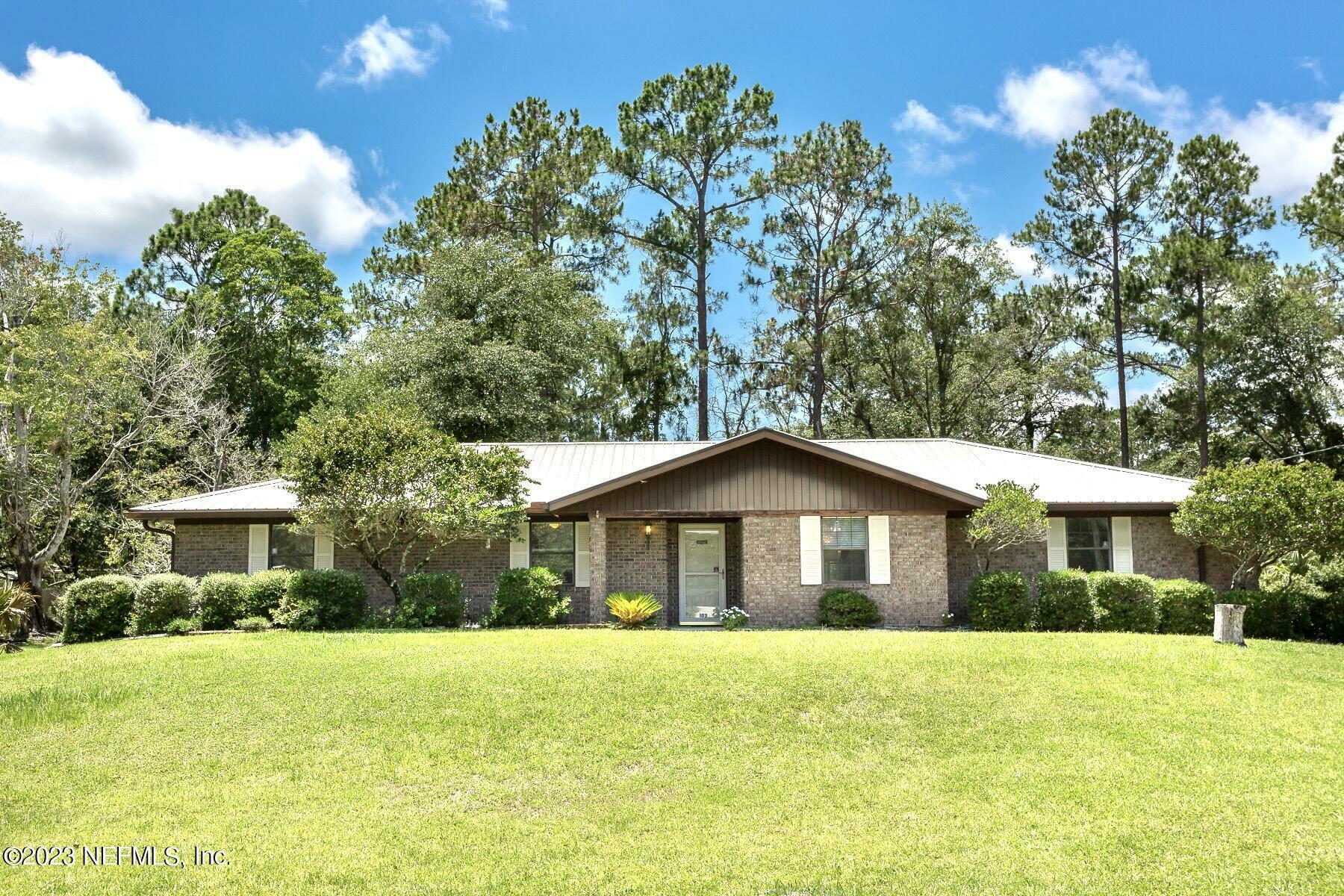 Property Photo:  103 Point Of Woods Trail  FL 32177 