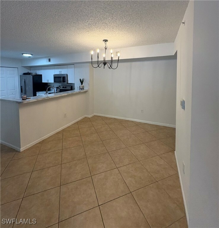 Property Photo:  1810 Florida Club Circle 1111  FL 34112 