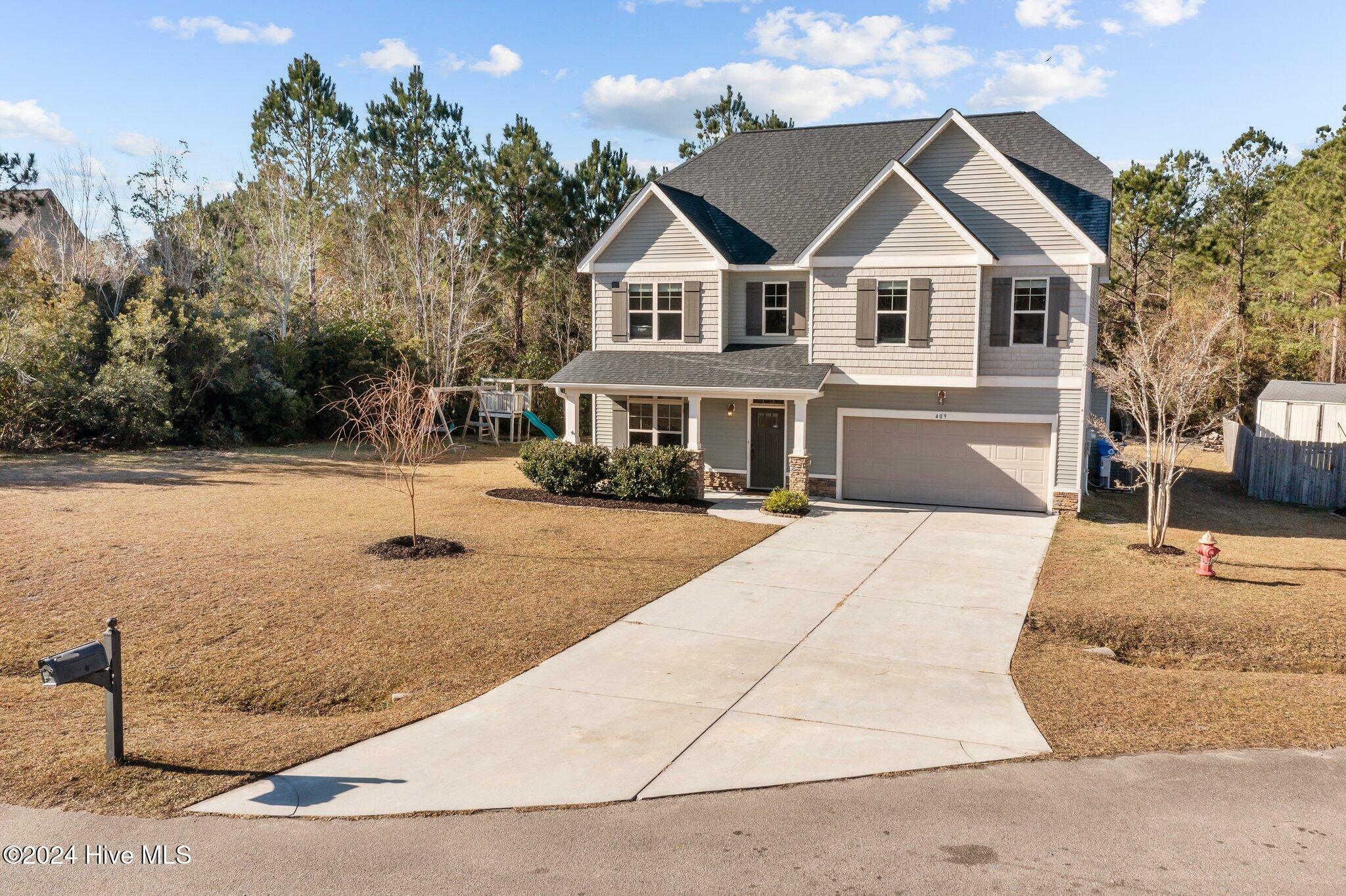 Property Photo:  409 Ponzer Court N  NC 28445 