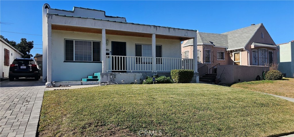 7619 La Salle Avenue  Los Angeles CA 90047 photo