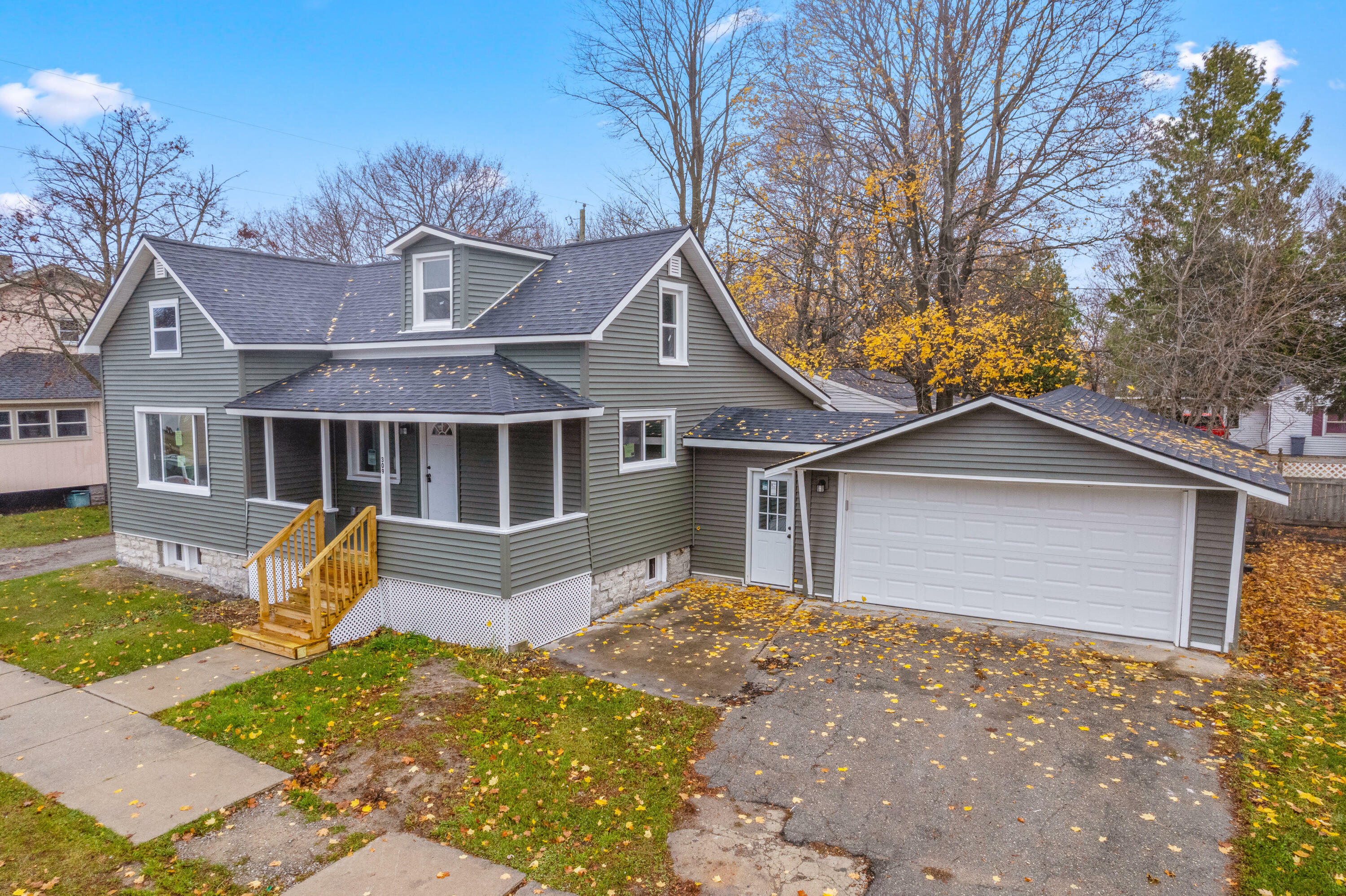 Property Photo:  309 S Fifth Avenue  MI 49707 