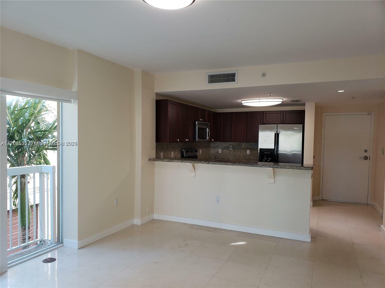 Property Photo:  2740 SW 28th 209  FL 33133 