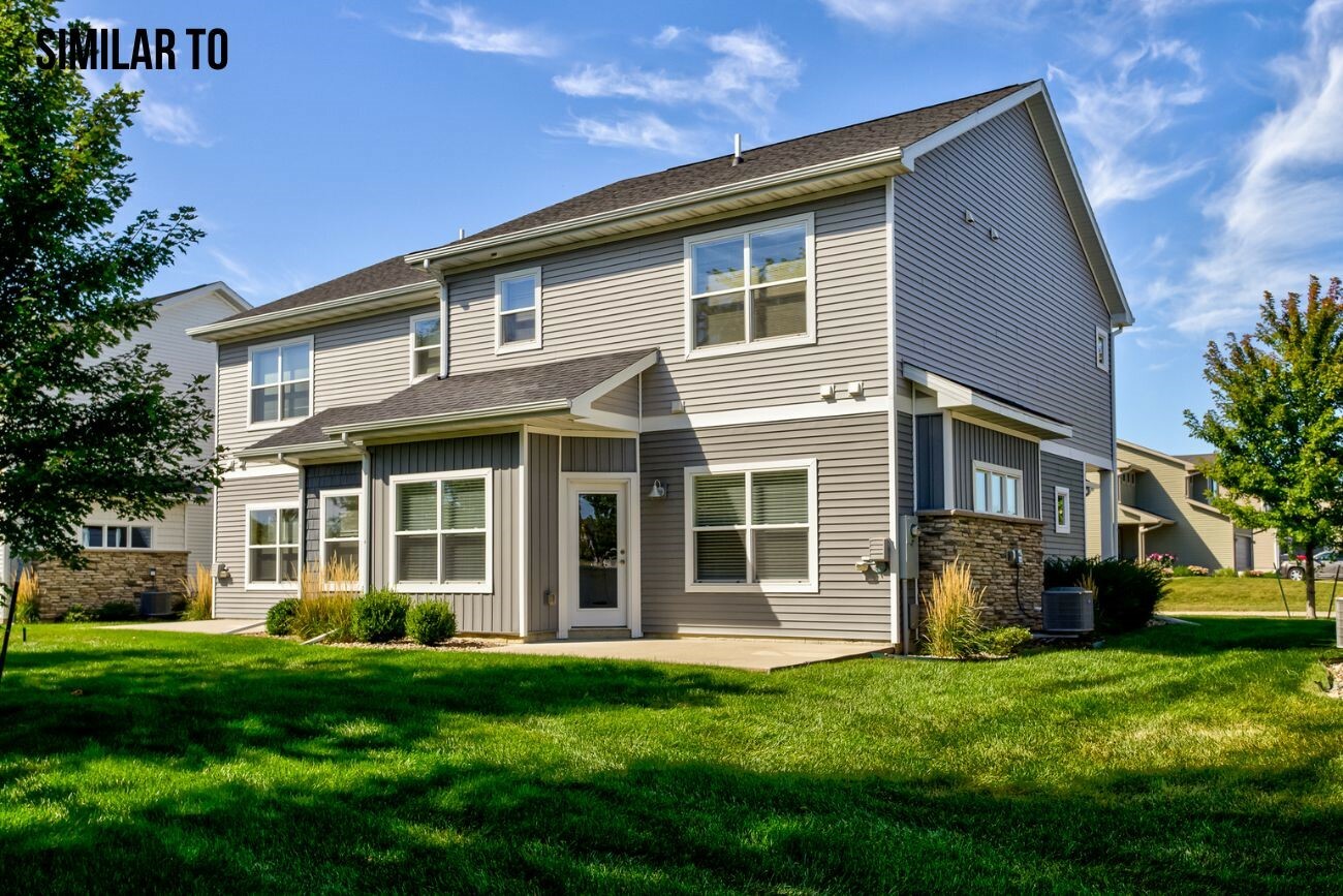 Property Photo:  306 Larson Drive  IA 50124 