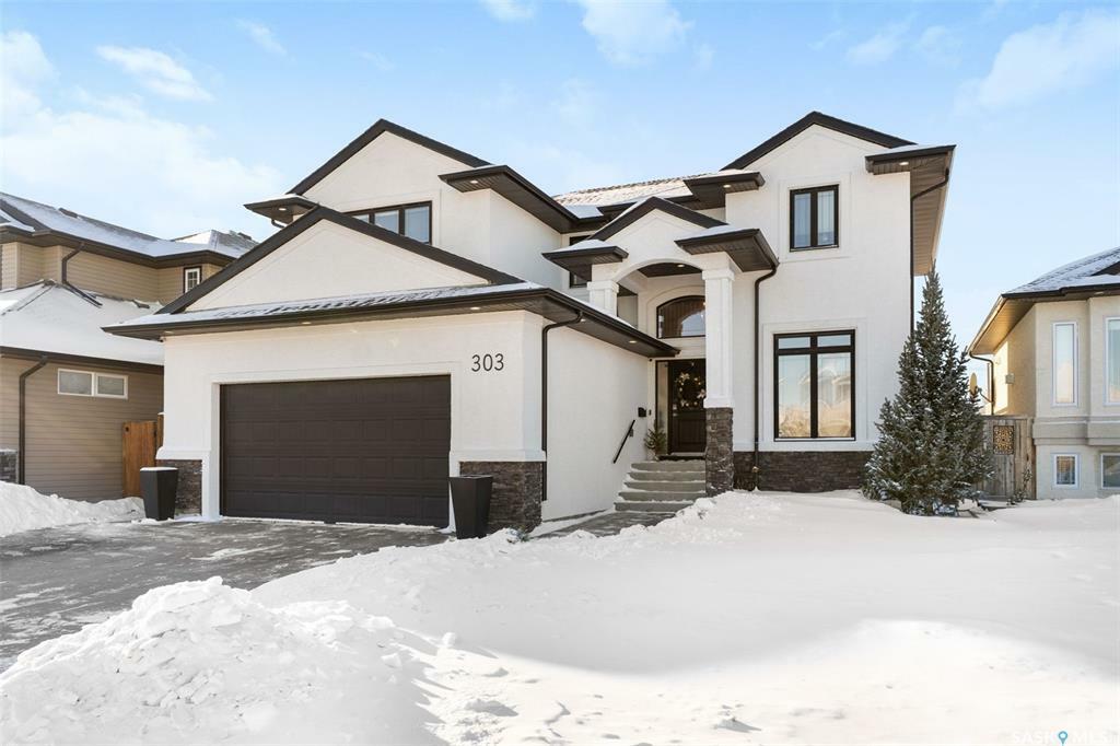 Property Photo:  303 Waters Crescent  SK S7W 0A5 