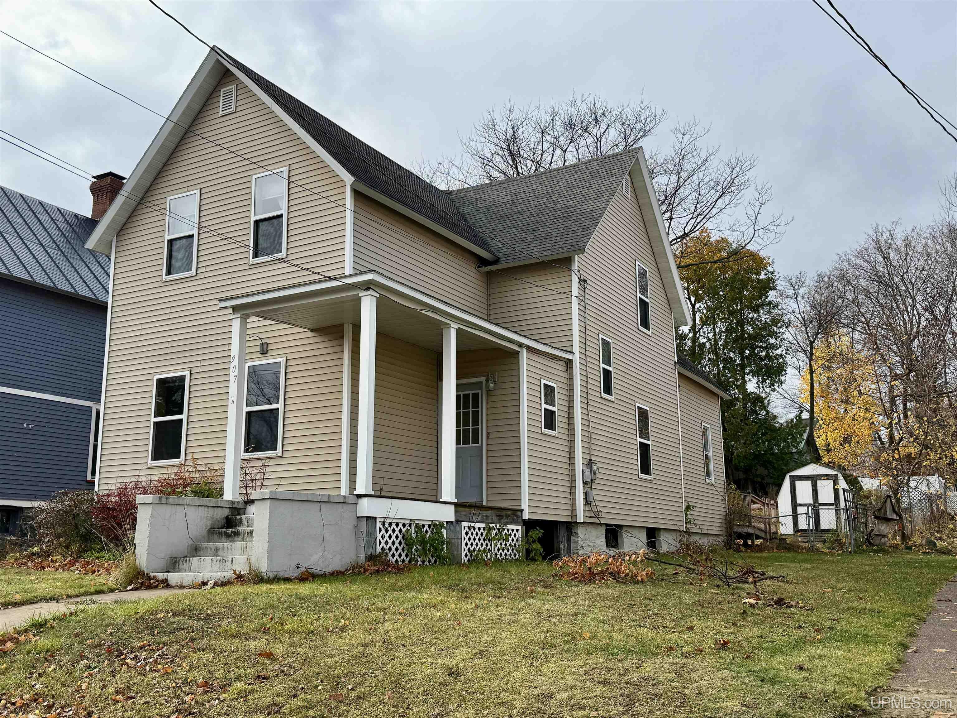 Property Photo:  907 Pine Street  MI 49855 