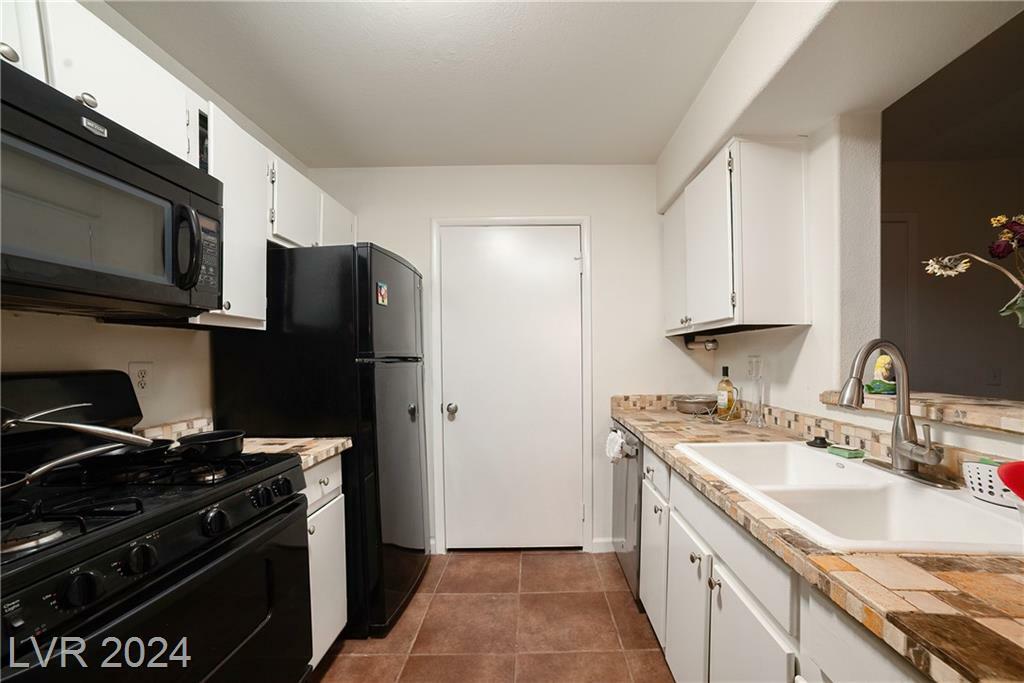 Property Photo:  2120 Ramrod Avenue 415  NV 89014 