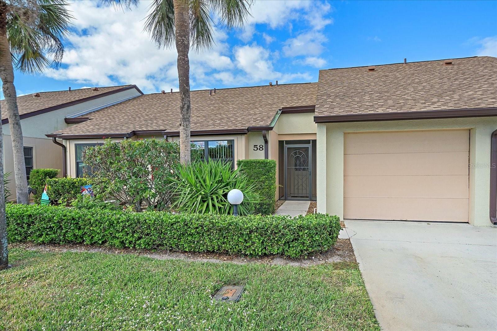 Property Photo:  1211 Capri Isles Boulevard 58  FL 34292 